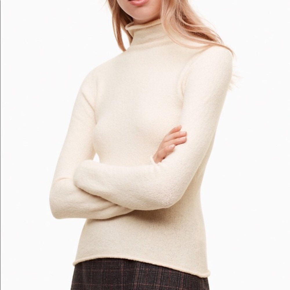 Soft body hugging Wilfred sweater